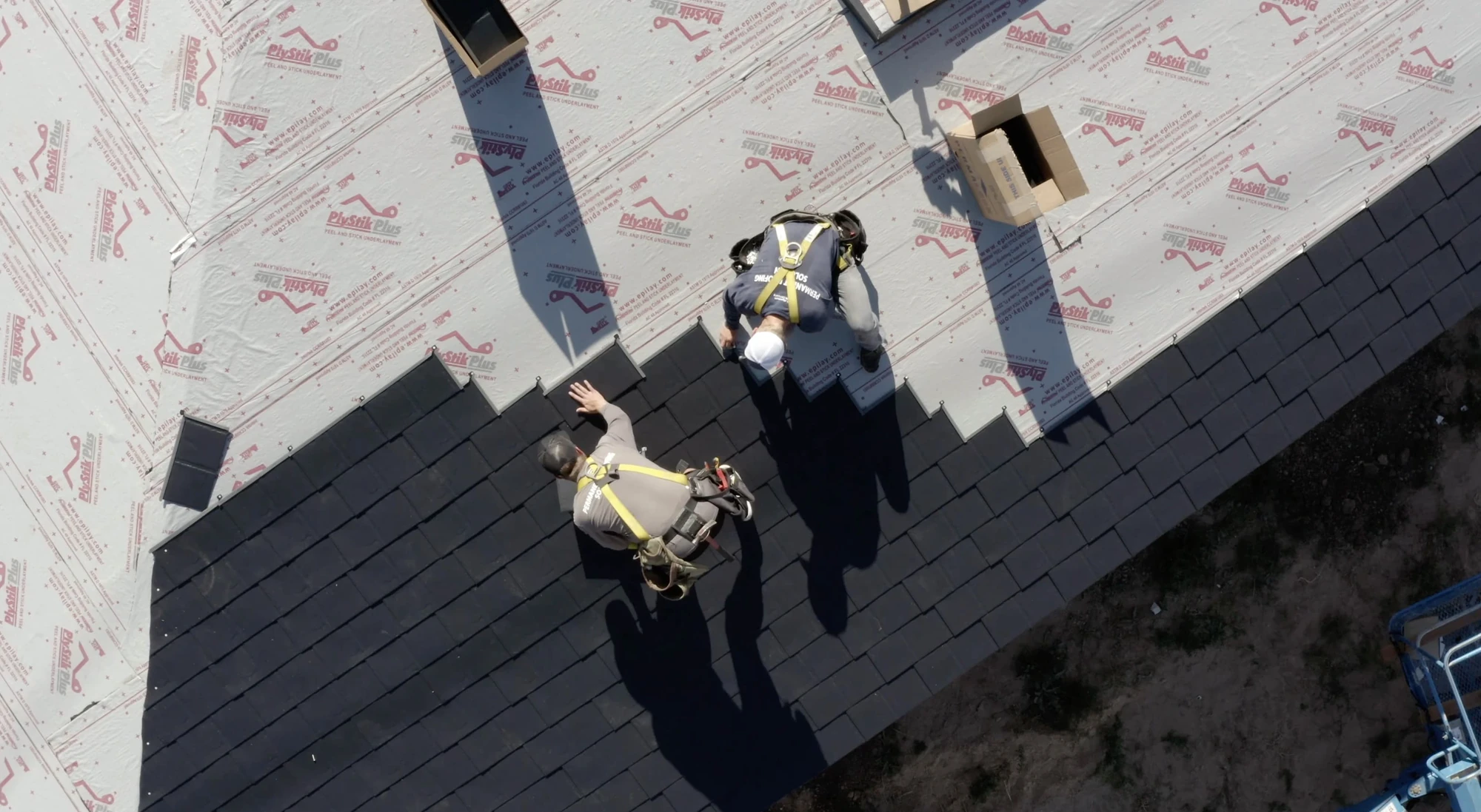 Shingles and underlayment during roof installation