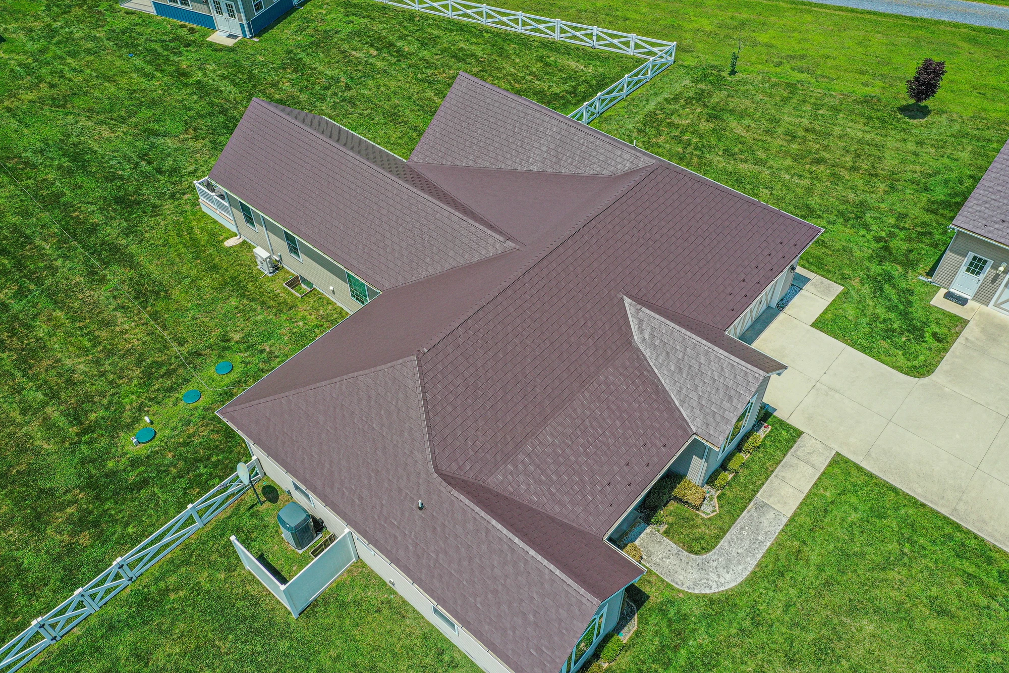 Brown roof with intersecting hips and valleys