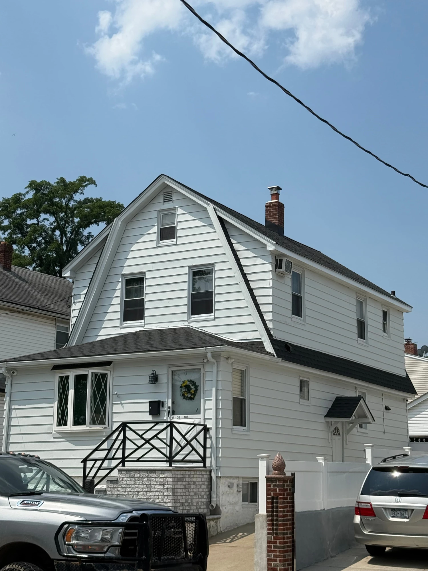 Roof on a white home with porch