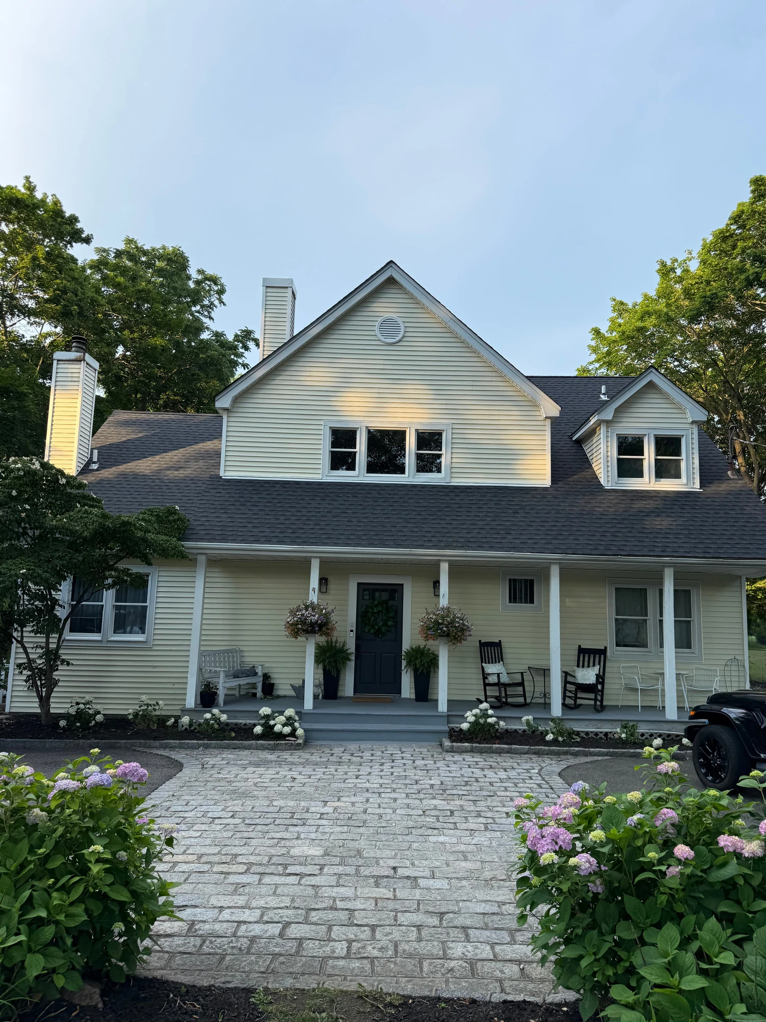 Roof on a white colonial home