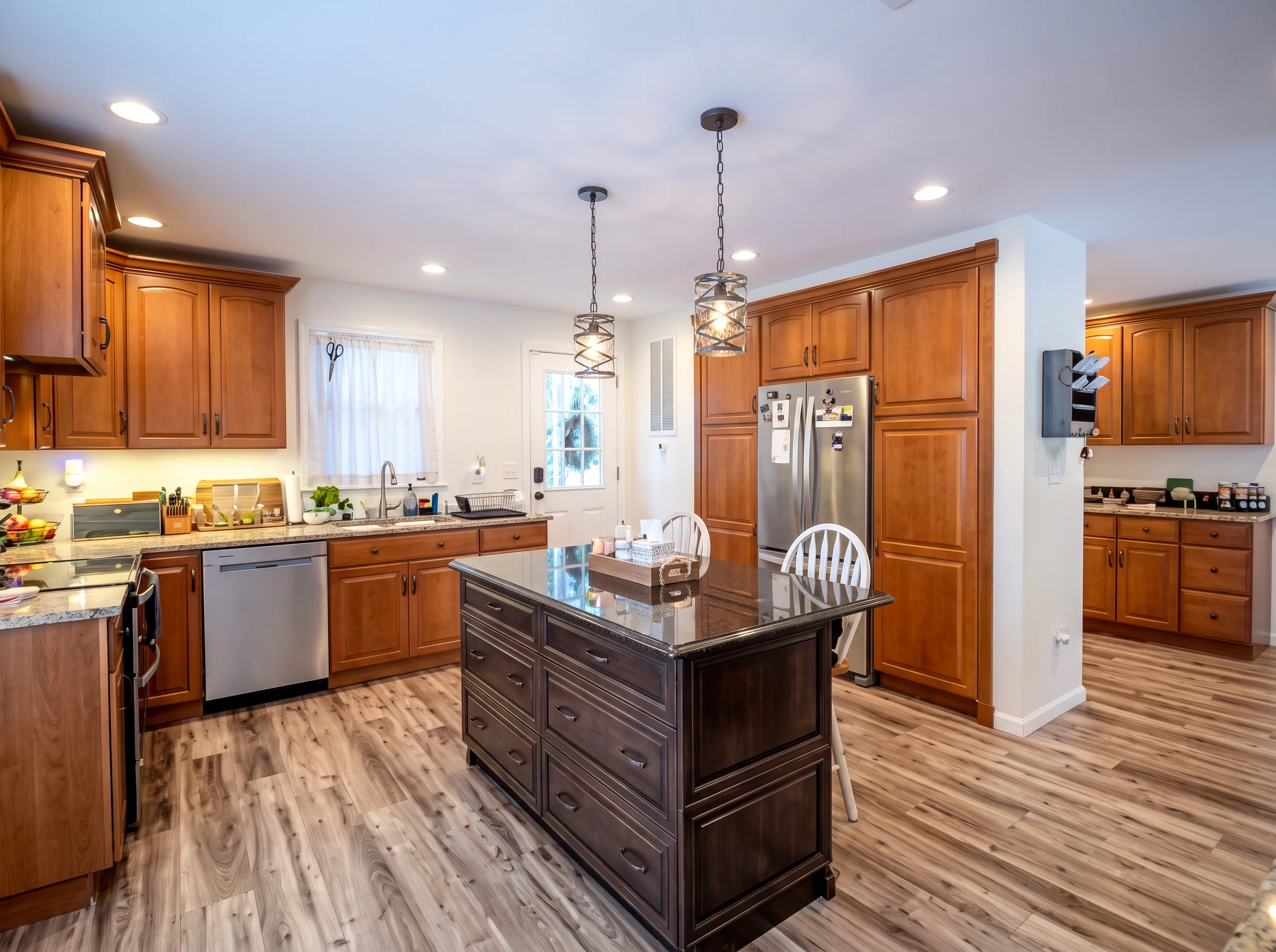 Kitchen remodel with dark island in Deer Park, NY